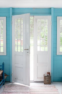 white door blue wall